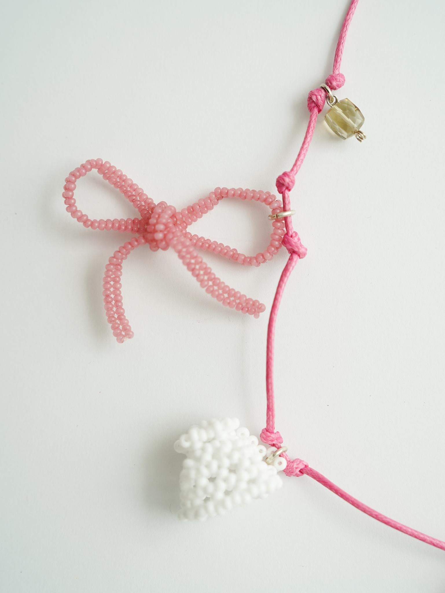 Mikita Kunitsky - Pink Thread with Charms