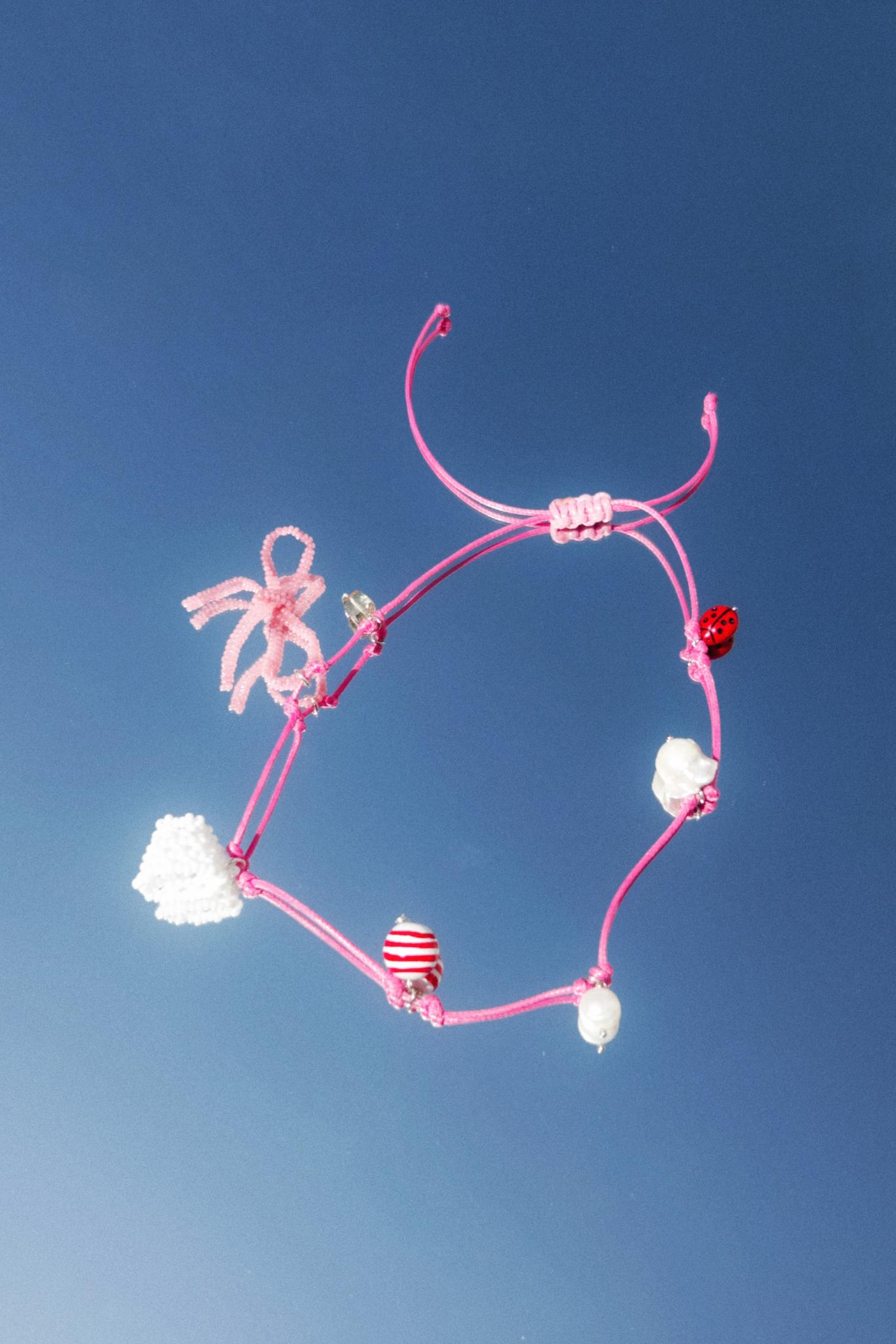 Mikita Kunitsky - Pink Thread with Charms